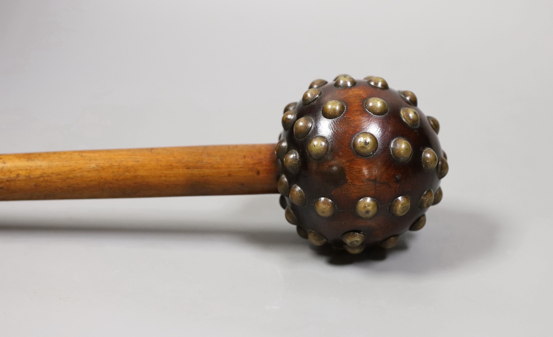 A 19th century Zulu studded hardwood knobkerrie, 65cm long